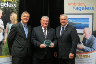 Dr. Edgar Williams (centre) St. John's-Avalon Chapter Chair receives 2014 Seniors of Distinction Award from (R) the Hon. Clyde Jackman, NL Minister of Seniors and (L) Kevin Pollard, Parliamentary Assistant